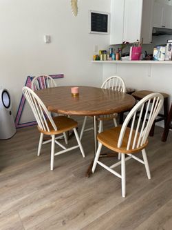 Wooden oval dining table with 4 chairs