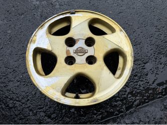 One Nissan Skyline 15-inch Aluminum Silvia rim and caps 4 lug