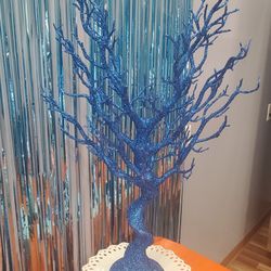 Two blue glitter tree displays