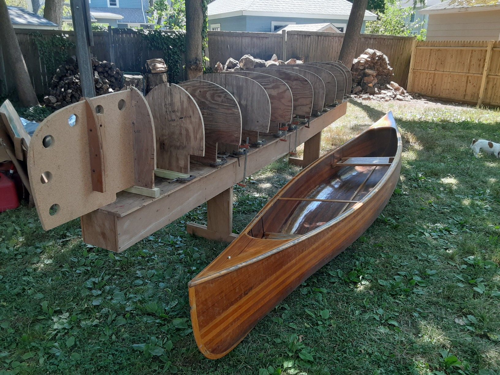 Molds and strong back for building a canoe