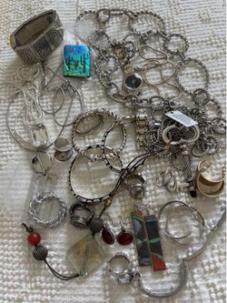 Lot of silver tone misc jewelry