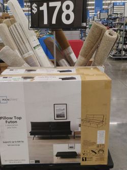 Pillow top futon..... Couch that turns to a bed.