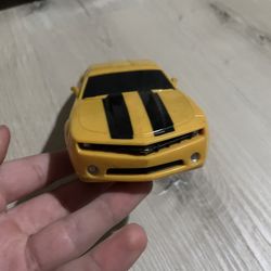 Jada Toys Yellow Chevy Camaro Toy Car With Black Racing Stripes 