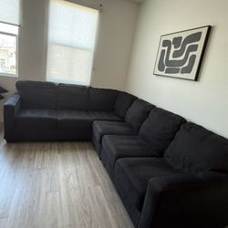 charcoal grey L couch 