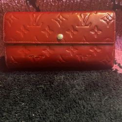 Pre-love in good condition authentic Louis Vuitton Scarlet Embossed Wallet authentic pre