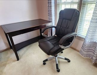 Wooden table with executive chair