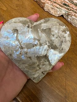 Labradorite heart with stand. Has blue and white flash