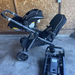 Used Evenflo Stroller And Car Seat  Pivot Expand With Adapter