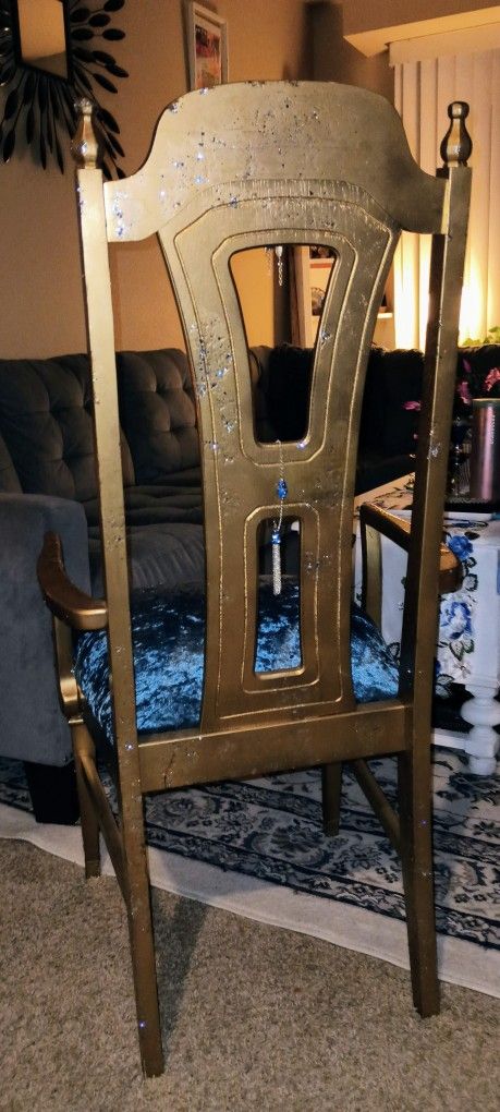 One Of A Kind Chair. A Shiny Matt Gold With Soft Blue Cushion.