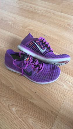 Woman’s Purple Nike shoes