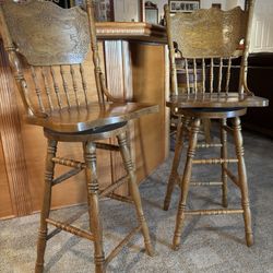 Pair of Oak High Back Swivel Chairs