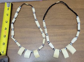 2 bone necklaces