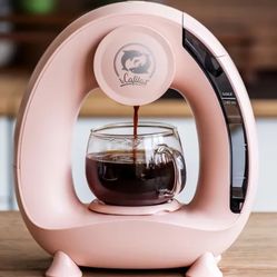 ● New in Box ● Single-Serve Coffee Maker ● Uses K-pods or Grounds ● Very unique, cool style in pink