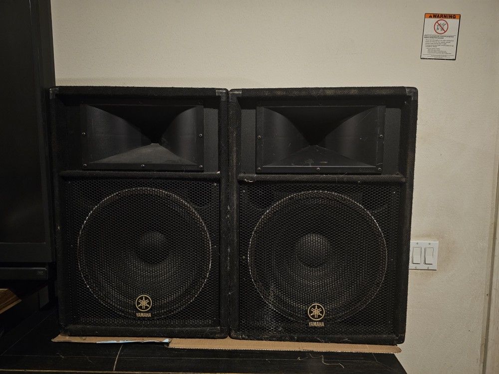 Yamaha S115V Club Series V passive PA speakers.