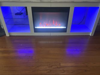 Tv stand with Fireplace an LED light