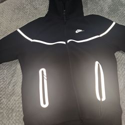 Black reflective Nike tech