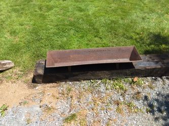 Antique Raymond and Campbell cast iron feeding trough
