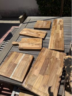 Solid teak wood cutting boards and cheese boards