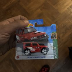 2023 Hot Wheels Mitsubishi Pajero Evolution - 1:64 1/64 Mud Studs 3/5 Red