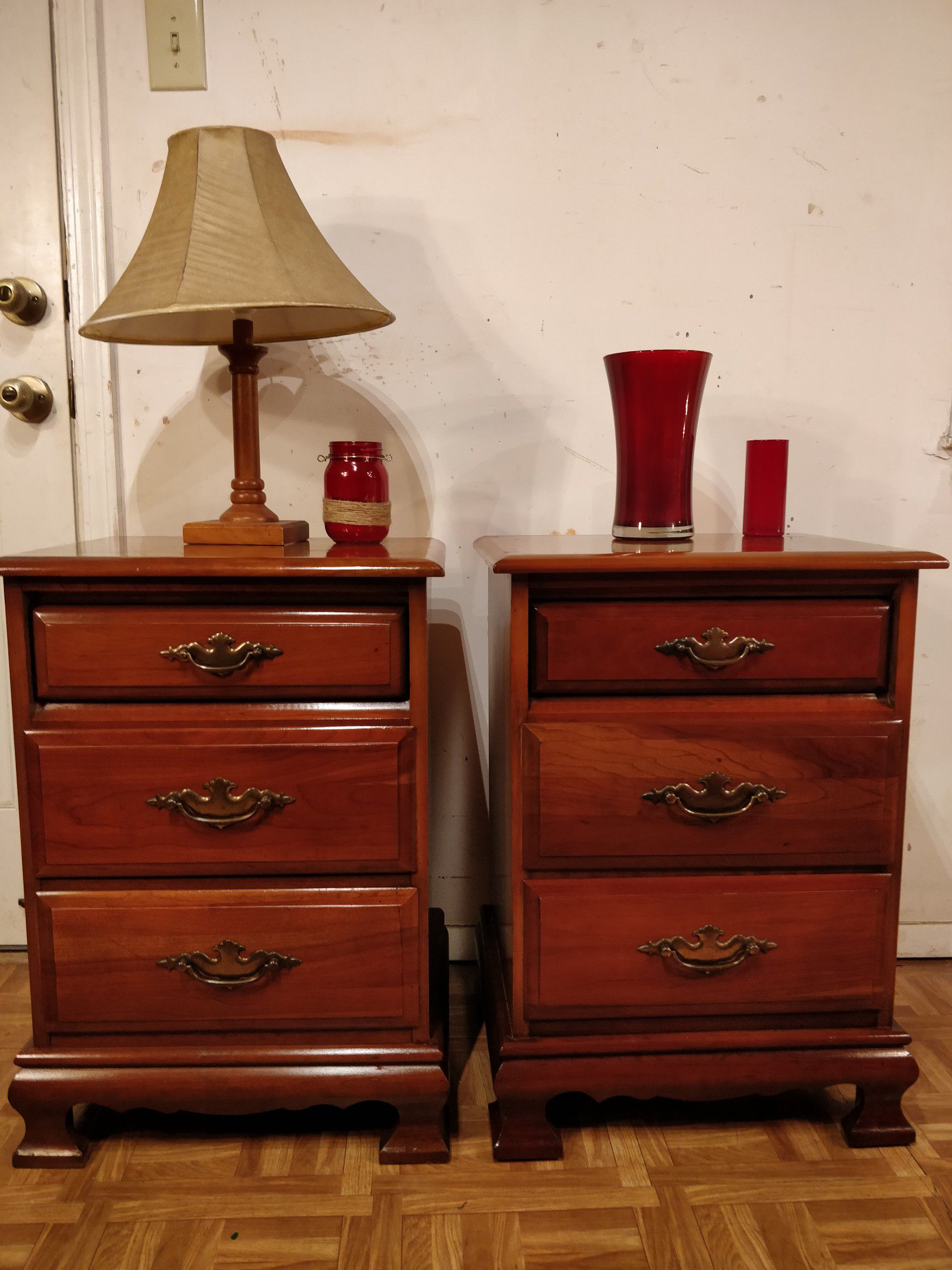 Solid wood 2 night stand with 3 drawers each in very good condition, all drawers sliding smoothly, pet free smoke free. L19"*W15.4"*H27"