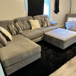 Gray sofa and ottoman 