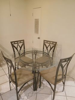 Glass top dining table