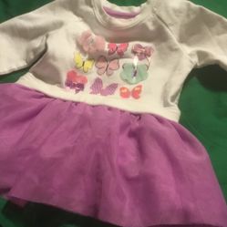 One Little Girl Dress Top Is White Skirt Of Dress Is Pu4ple  Size 12—18   0n Sale For 3.00