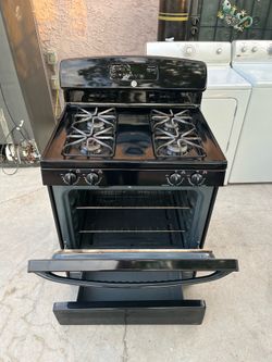 black General Electric gas stove / delivery available
