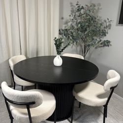 Round black fluted dining table set