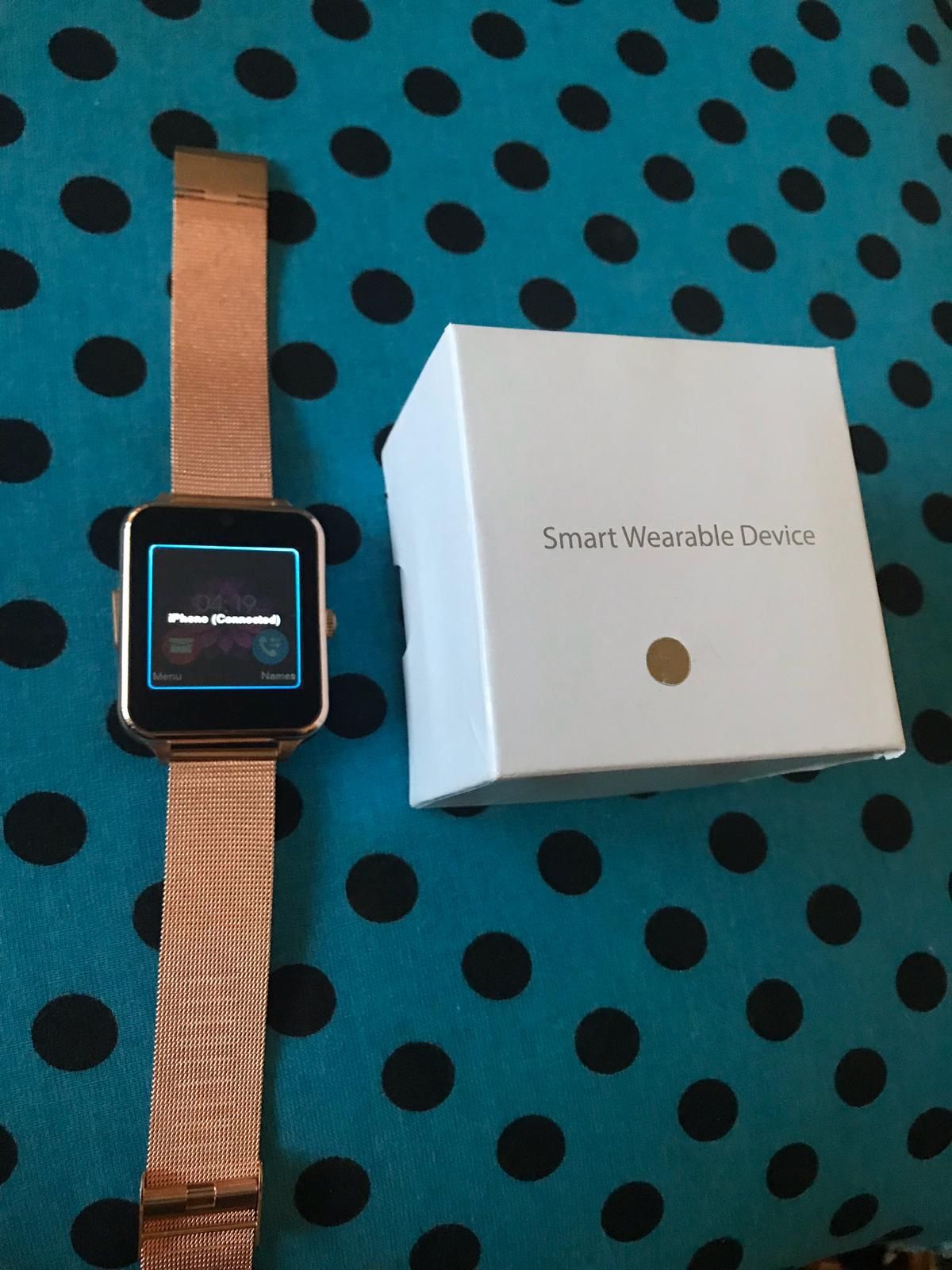 **BRAND NEW** SALE Smartwatch- pedometer, calling,SMS,and camera.SILVER GOLD AND BLACK