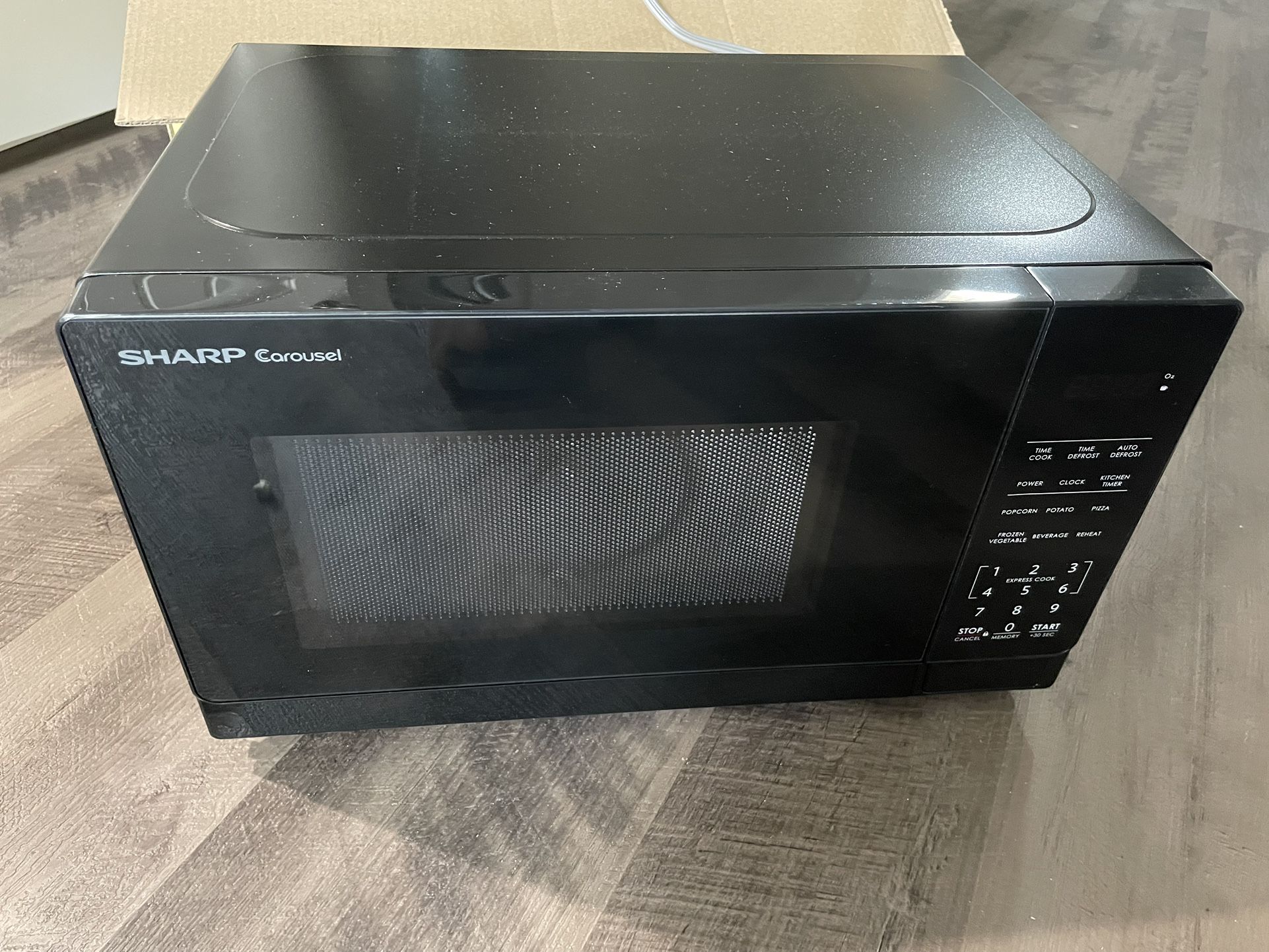 Sharp 1.1 cu ft Stainless Countertop Microwave with 1000 watts - Black