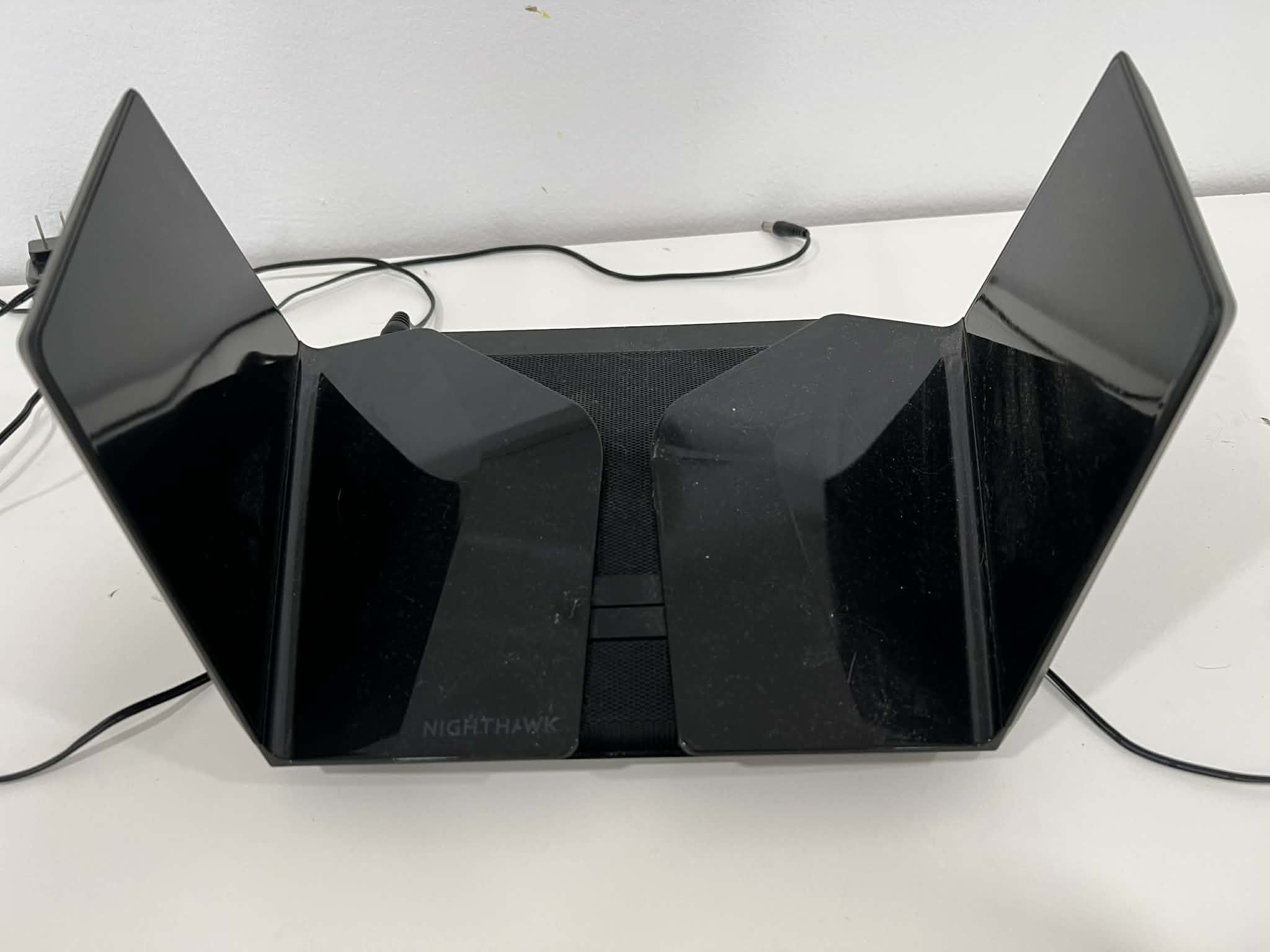 NETGEAR Nighthawk WiFi 6 Router (RAX200) 12-Stream Gigabit Router AX11000 Tri-Band Wireless Speed (Up to 10.8 Gbps) Coverage Up to 2500 sq.ft. and 50