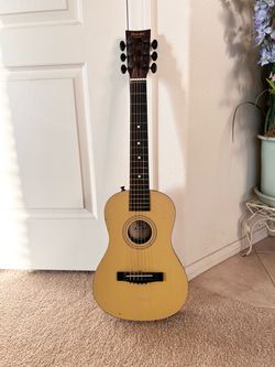 31- inch First Act Discovery Acoustic Guitar.