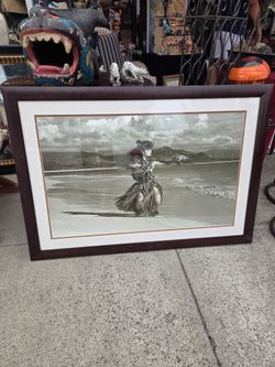Black-and-white photographic print from the *hula kahiko* series by Hawaiian artist Kim Taylor Reece.