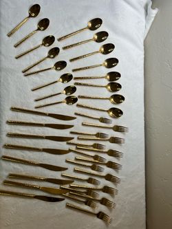 Gold silverware 2 sets of eight