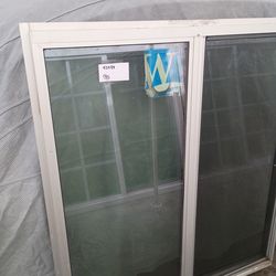 Sliding glass window size 43x49 new construction