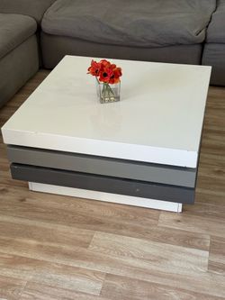 Coffee table swivels
