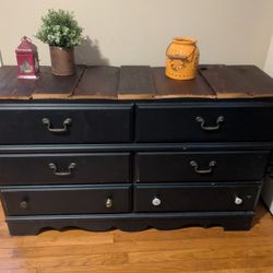 Dresser modded to be tv stand with custom game and movie storage