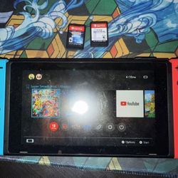 Nintendo Switch + 2 Games 