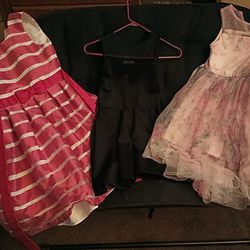 Girls Dresses Good Condition Red One Size 12 ,Black one Size 10, Purple One Size 6x $5.00 Each 