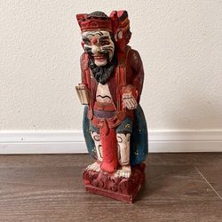 Handcrafted Wooden Sculpture with Intricate Details from Bali
