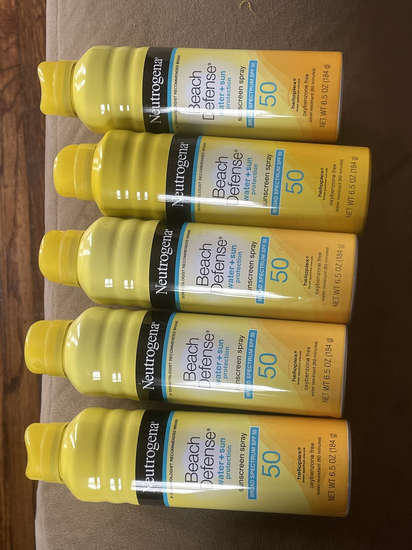 5 Brand New Cans Of Neutrogena Beach Defense Sunscreen 