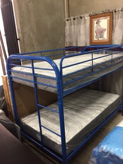 New twin bunkbeds with mattresses $295