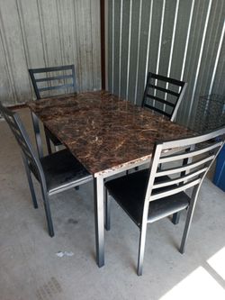 Light Metal Table And Chair Set.
