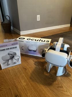 Oculos Quest With stand Barely Used