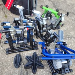 Several bike bicycle trainers trek cycleops etc with a couple of riser blocks all for $60 FIRM