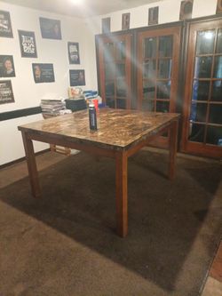 Marble top size : 54 inch; Wooden legs size: 34 inch