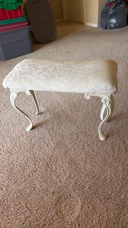 White Upholstered Bench with Ornate Metal Legs