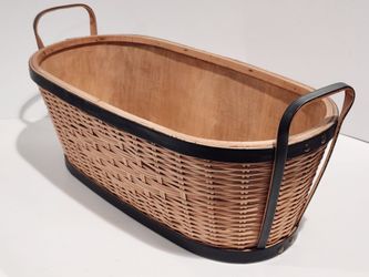 Basket with black trim and handle oval shape