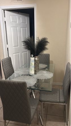 Glass table and 4 chairs
